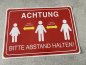 Preview: achtung-bitte-abstand-halten-mindestens-2meter-roter-hintergrund-aufkleber-25-x-17-5cm